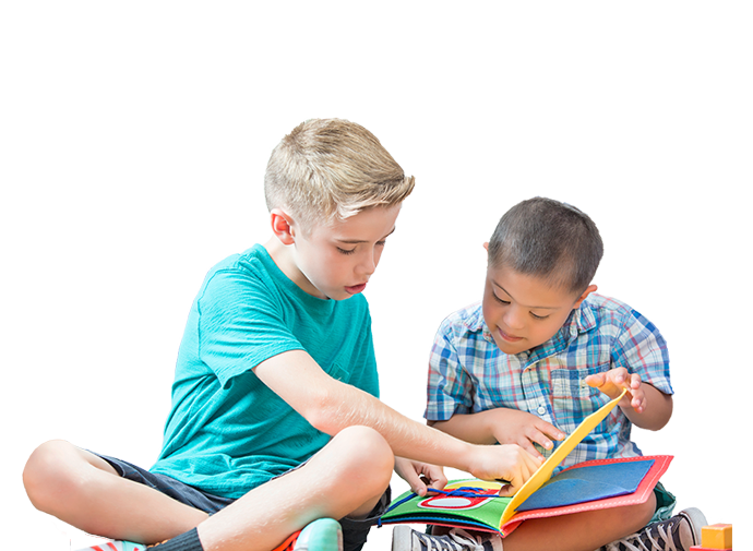 children reading a book together